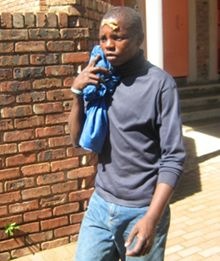 [BoyDube_20_hackedTwoWomenAndBabyToDeathInjured12MayflowerZA_Beeld[5].jpg]