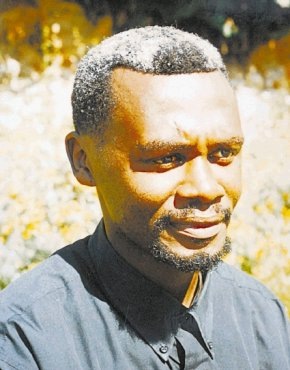 [Yoyo Xolani 40 executed hours after elected chairman of Ikamvelihle CPF Sept2009[4].jpg]