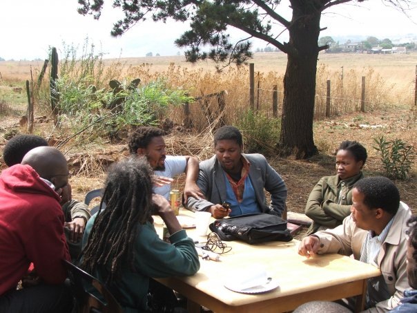 [Andile Mngxitama third left facing camera Blackwash Group meeting 8 Oct2009[5].jpg]