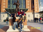 Photo: The band taking a break by the statue outside the ballpark.