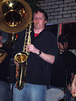 Photo: Jeff playing a saxophone solo.