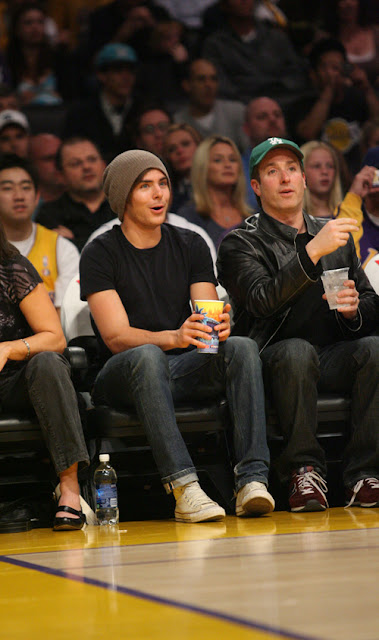 Zac Efron having a good time at the LA Lakers game. The Los Angeles Lakers defeated the Memphis Grizzlies by the final score of 99-89 at Staples Center in downtown Los Angeles, CA. <P> Pictured: Zac Efron <P> <B>Ref: SPL84529 030309 </B><br> Picture by: Kevin Reece / London Ent / Splash News </P><P> <B>Splash News and Pictures</B><br> Los Angeles: 310-821-2666<br> New York: 212-619-2666<br> London: 870-934-2666<br> photodesk@splashnews.com<br> </P>