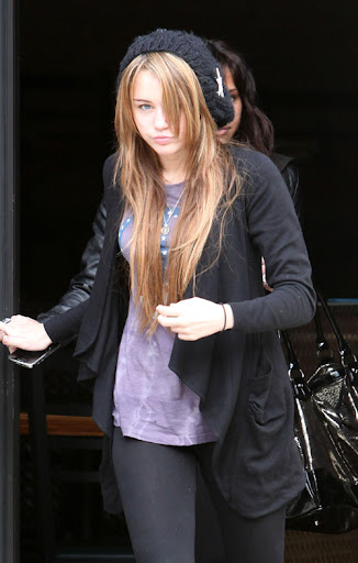 29445, LOS ANGELES, CALIFORNIA - Saturday 21st March 2009. Miley Cyrus heads to Dan's Sushi in Studio City with boyfriend Justin Gaston. Miley was unusually shy and hid her face from cameras but still smirked when photographers called out her name. Photograph: James Breeden/Max Butterworth/PacificCoastNews.com ***FEE MUST BE AGREED PRIOR TO USAGE*** UK OFFICE: +44 131 557 7760/7761/7762 US OFFICE: + 1 310 261 9676