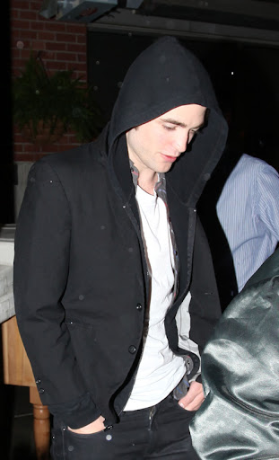 IMAGE ID # 2193040 Robert Pattinson celebrates his 23rd birthday in Vancouver, BC, Canada Wednesday night. Fans endured the rainy weather for a chance to see Robert and he was gracious enough to pose with a few of them before leaving. Despite his last year being a life-changing one for the young heartthrob, Pattinson remained somewhat subdued while celebrating his birthday with castmates and friends. 05/14/2009 --- Robert Pattinson --- (C) 2009 Fame Pictures, Inc. - Santa Monica, CA, U.S.A - 310-395-0500 / Sales: 310-395-0500