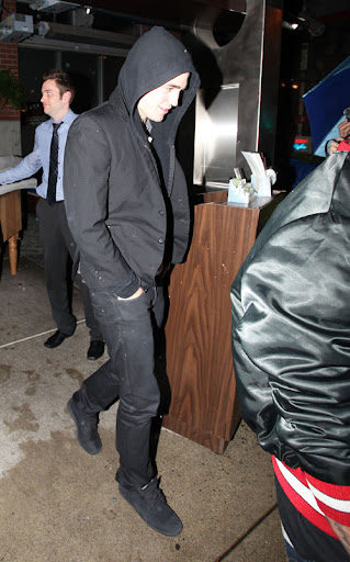IMAGE ID # 2193048 Robert Pattinson celebrates his 23rd birthday in Vancouver, BC, Canada Wednesday night. Fans endured the rainy weather for a chance to see Robert and he was gracious enough to pose with a few of them before leaving. Despite his last year being a life-changing one for the young heartthrob, Pattinson remained somewhat subdued while celebrating his birthday with castmates and friends. 05/14/2009 --- Robert Pattinson --- (C) 2009 Fame Pictures, Inc. - Santa Monica, CA, U.S.A - 310-395-0500 / Sales: 310-395-0500