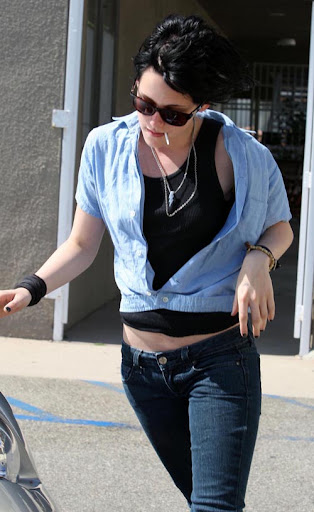 06-19-09 North Hollywood, CA 'Twilight' star Kristen Stewart leaves 'The Runaways' production office with the same sucker that she has been sucking on for 2 hours, poor sucker....also pics of her costume for her movie its says Joan on it... Non-Exclusive Pix by Flynet ©2009 818-307-4813 Nicolas 310-869-0177 Scott