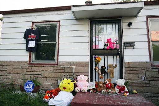 GARY, INDIANA - JUNE 25: Stuffed animals and flowers sit outside the former childhood home of Pop Star Michael Jackson on June 25, 2009 in Gary, Indiana. Jackson, 50, the iconic pop star, died after going into cardiac arrest in a hospital today in Los Angeles, California. (Photo by Tasos Katopodis/Getty Images)