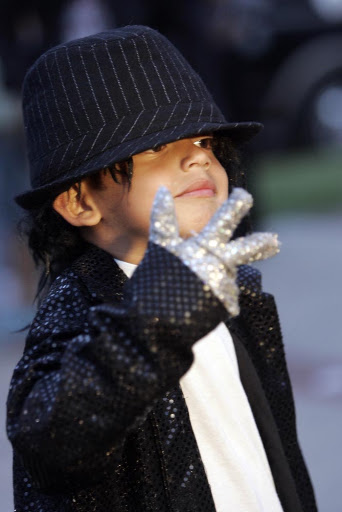 LOS ANGELES - JUNE 25: Victor Chupina, 5, is dressed as Michael Jackson as people pay their respects to him at UCLA Medical Plaza June 25, 2009 in Los Angeles, California. Jackson, 50, the iconic pop star, died after going into cardiac arrest today in Los Angeles, California. (Photo by Ann Johansson/Getty Images) *** Local Caption *** Victor Chupina