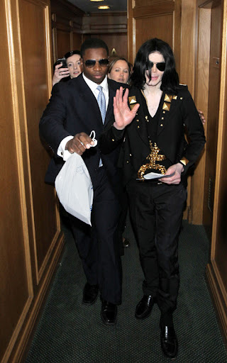 **File Photo** * JACKSON HOSPITALISED AFTER CARDIAC ARREST - REPORT MICHAEL JACKSON is reportedly in hospital after suffering a heart attack. The Thriller superstar's aides frantically called an ambulance to come to Jackson's Holmby Hills mansion in Los Angeles earlier today (25Jun09), according to TMZ.com. Reports suggest the singer's condition was so bad, medics were forced to administer CPR en-route to a nearby hospital - to keep him alive. Jackson's worried family members are allegedly rushing to his bedside. Earlier this month (Jun09), family insider Arthur Phoenix told WENN the superstar was in a bad way and should not be considering a 50-concert run in London, scheduled to start in July (09). He insisted the concerts would not happen, stating, "Michael is not mentally, physically or spiritually ready for these shows. There's something missing in his soul... It's over! There are family members who feel the same way but they're afraid to speak." Phoenix fears the pressure of the c