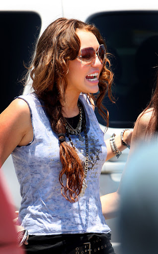 Miley Cyrus is all smiles and waves as she arrives at her film set with her sister Brandi, after returning from Dallas where she sang on stage with the Jonus Brothers, fueling rumors that she and Nick Jonas are back together again. <P> Pictured: Miley Cyrus and brandi Cyrus <B>Ref: SPL108255 220609 </B><BR/> Picture by: Sinky/Macca/Splash News<BR/> </P><P> <B>Splash News and Pictures</B><BR/> Los Angeles: 310-821-2666<BR/> New York: 212-619-2666<BR/> London: 870-934-2666<BR/> photodesk@splashnews.com<BR/> </P>