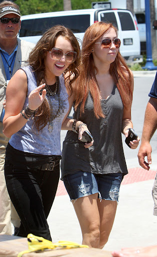 Miley Cyrus is all smiles and waves as she arrives at her film set with her sister Brandi, after returning from Dallas where she sang on stage with the Jonus Brothers, fueling rumors that she and Nick Jonas are back together again. <P> Pictured: Miley Cyrus and brandi Cyrus <B>Ref: SPL108255 220609 </B><BR/> Picture by: Sinky/Macca/Splash News<BR/> </P><P> <B>Splash News and Pictures</B><BR/> Los Angeles: 310-821-2666<BR/> New York: 212-619-2666<BR/> London: 870-934-2666<BR/> photodesk@splashnews.com<BR/> </P>