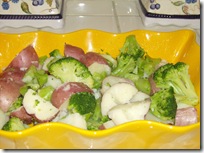 Vegetables in dish before cheese