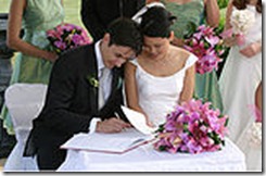160px-Bride_and_groom_signing_the_book[1]