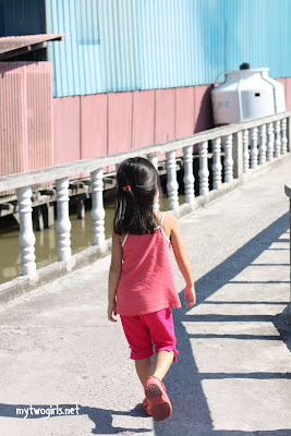 Zara walking to the fishing boats