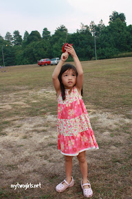 Zara having a go at the kite