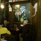 The little sign reads 'Reserved for Bartolo and Giovanni', who like this painting enough to sit here every night.  Rawk!