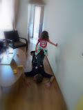 Lily helps Dad with his back.