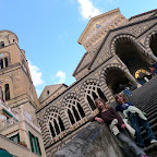 Amalfi church and bell tower at the base of the mountain.