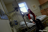 They take her first vital signs.