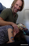 If you fall asleep next to daddy on the airplane , he will cover you with Justin Beiber stickers from your J-14 magazine.