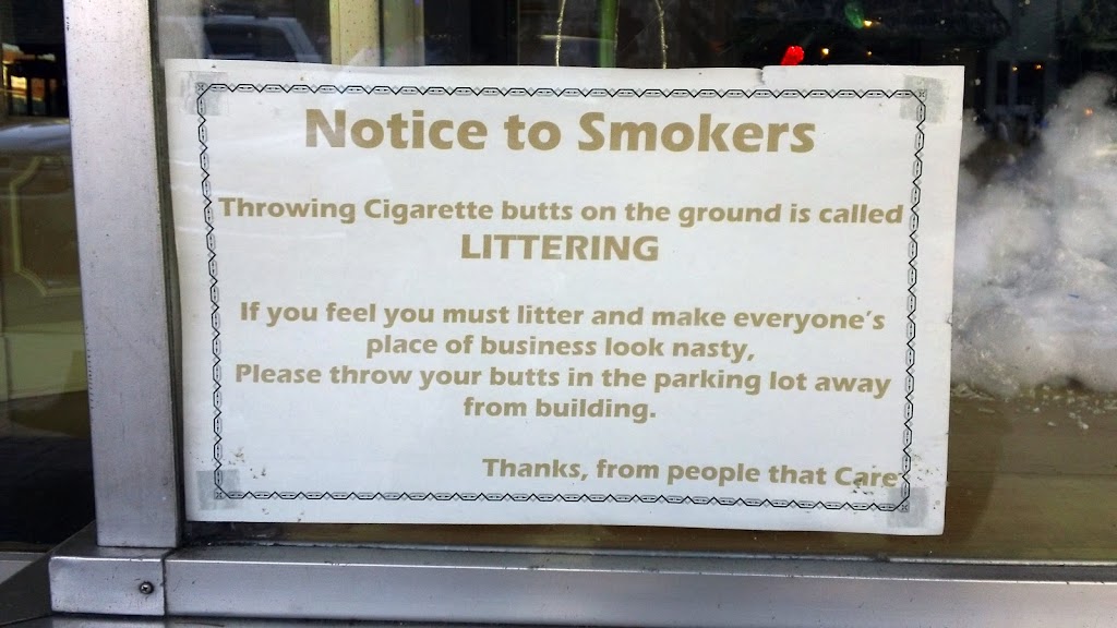 Notice to smokers, throwing cigarette butts on the ground is called LITTERING. If you feel you must litter and make everyone's place of business look nasty, please throw your butts in the parking lot away from the building. Thanks, from people that care.
