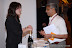 A delegate being assisted at the helpdesk