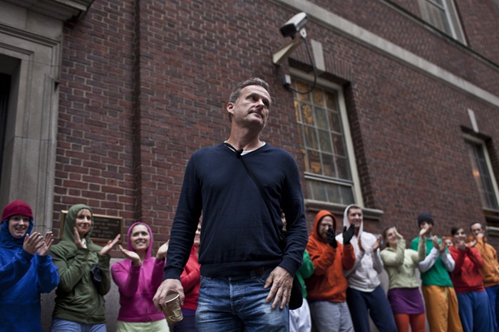 Choreographer Willi Dorner takes a bow at the end of his piece entitled "Bodies in Urban Spaces".  Starting at sunrise, the performers inched their way into different spaces throughout lower Manhattan.CREDIT: Bryan Derballa for The Wall Street JournalNYBODIES