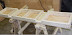 The 2x4 box beam bottom plate has notches for lifting straps or forklift tines