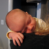Shoulder time with mommy. (March)