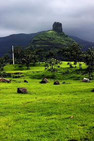 Pinnacle of Kothaligadh with base village Peth