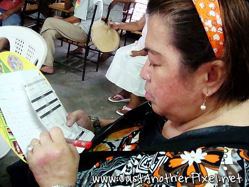 [Nanay completing her list[2].jpg]