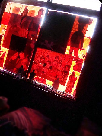 Sheets of red paper cover my windows - JustAnotherPixel.net