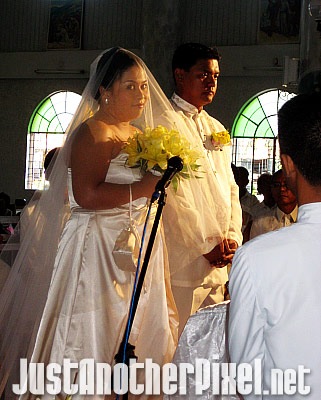 Awww... she looked at me while I was taking photos of her during the ceremony - JustAnotherPixel.net