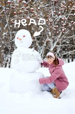 [ist2_11496095-teenage-girl-making-a-snowman[7].jpg]