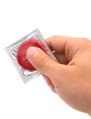 holding-condom hand