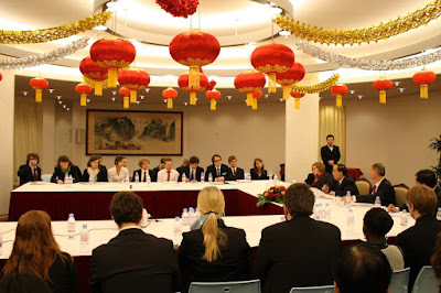 Ambassador sits with Students