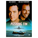 Pushing Tin