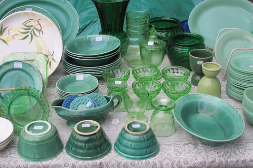 Green pottery and Depression glass was displayed on an antique lace tablecloth. The jadite (on the right) has always been a favorite of Martha's.