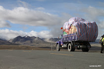Fully loaded Tibetan truck at high pass heading towards Mt. Everest Base Camp