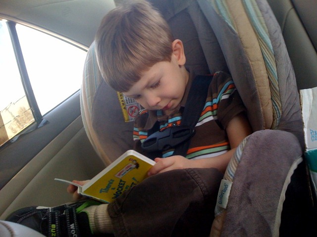[Aaron reading with his leg crossed[3].jpg]