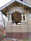 Porch detail showing some paint and tuck pointing