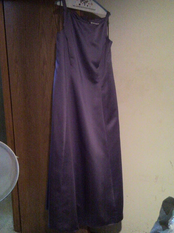 I have this gorgeous medium colored purple fancy dress in a size 22W. Label: Betsy and Adam by Jaslene.  Comes with a wrap/shawl which I used to wrap around a bun in my hair. Doctors gave me thyroid medicine earlier this year and now I am no longer fitting into this incredible gown. Have been storing it in a dry cleaning bag from the last cleaning. I am available in the evenings or this weekend. Asking $55 obo.Will consider trade for sewing stuff (of equal value: i.e. thread, serger thread, notions, fabric) or one or two sturdy banquet tables (plastic or wood, need one to be very sturdy, 5-6 long, can fold or just have folding legs). Cash is best as I need to fix my car asap.Had to lighten up the only picture I could find of me wearing it. Location: Tigardits NOT ok to contact this poster with services or other commercial interests		