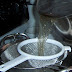 Start pouring the hot liquid slowly at first. Put a towel under the empty tamale pot. You might splash hot liquid!