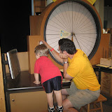 Erik and Tony study the pendulum exhibit