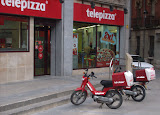 Hungry for pizza?  Have it delivered on a Moped.