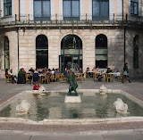 A little girl plays in a fountain in Burgos.
