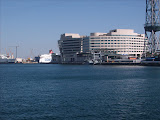 A nice view of the city of Barcelona and its port.