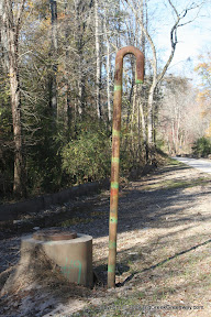 A sewer marker.  This area used to be muddy roads that followed utility lines.