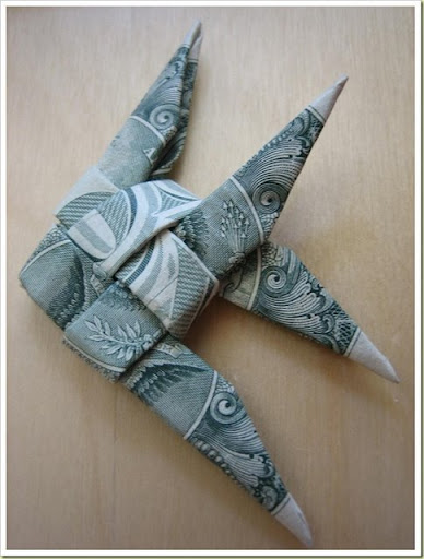 dollar bill origami fish. dollar bill origami fish.