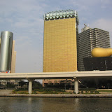 At the start of the cruise, you'll see the Asahi beer buildings, designed by Phillipe Starck. The one on the right is supposed to look like a head of foam on a beer, but has been nickname the golden turd.